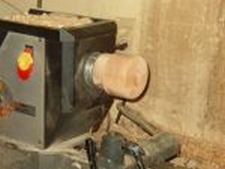 fasten a scrap wood block to the lathe 
