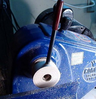 lock the spindle and use a bar 