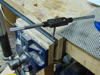 Tapping the hole is like driving a bolt with a wrench 