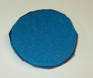 cutting out a foam backing pad