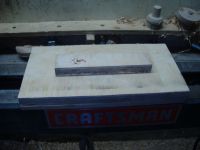 top of tray between wood lathe ways