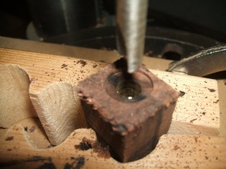 edge of the brass tube is evident 