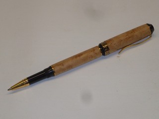 rollerball turned from figured, bird's eye' maple
