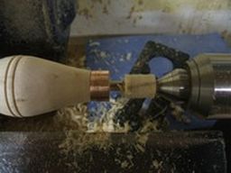 	Part in on the tail stock end to about 1/8"  and part off from the other end.	